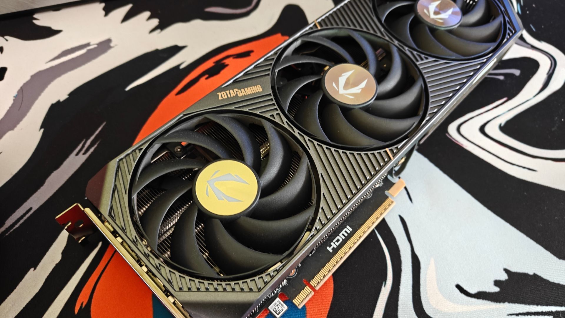 The triple-fan cooling design with vapor chamber does the trick (Image via Sportskeeda)