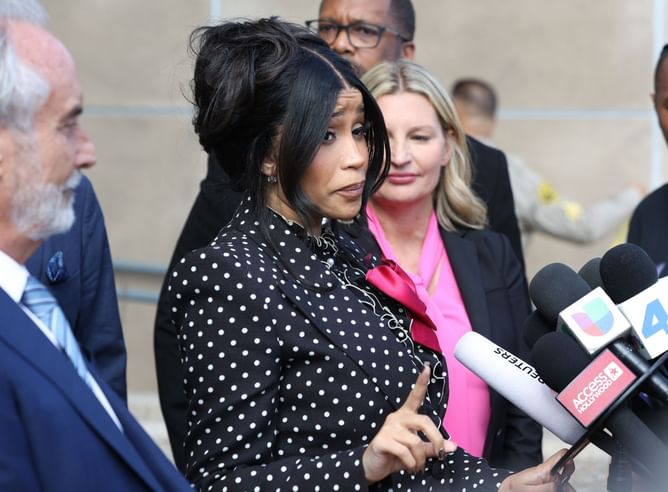 “Going to get sued for copyright now”: Netizens react as Cardi B drops "AM I THE DRAMA?" CDs featuring her viral courtroom looks