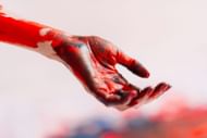 Investigators documented the word freedom written in blood at the scene (Image via Unsplash)