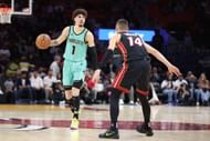 LaMelo Ball #1 of the Charlotte Hornets dribbles the ball against Tyler Herro - Source: Getty