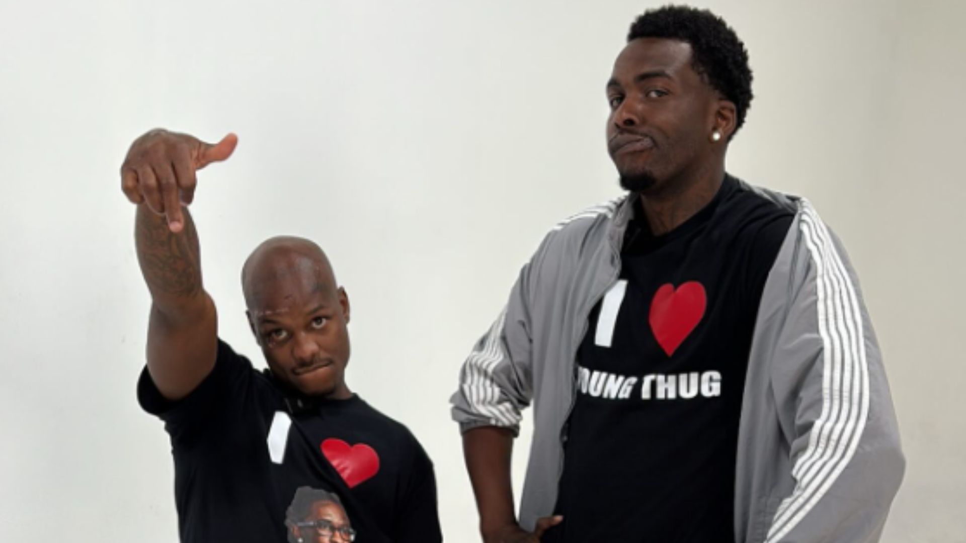 Woody and Yak Gotti wearing 