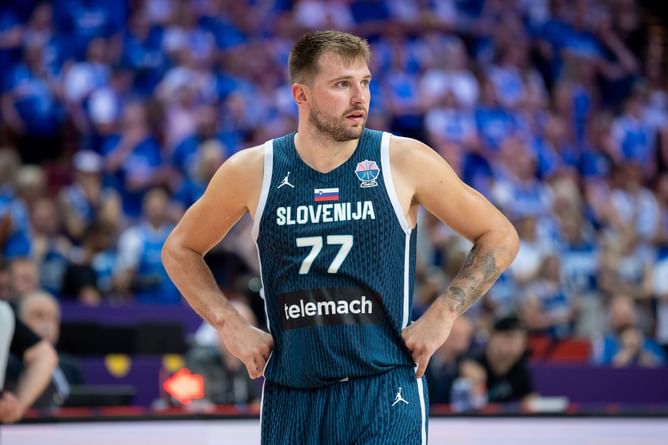 Watch: Luka Doncic accepts and nails Slovenia teammate's challenge on making shot from the tunnel for 50 pushups