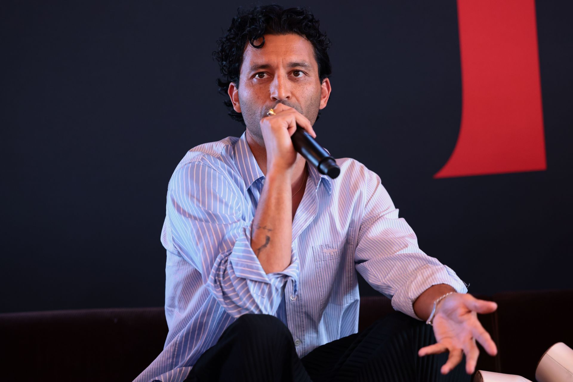 Justin Tipping speaks at HIM Training Camp Creator Event on August 05, 2025 in Venice, California. (Photo by Tiffany Rose/Getty Images for HIM Training Camp)