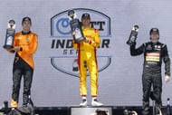 Christian Lundgaard, Alex Palou, and Colton Herta share a podium at the IndyCar Java House Grand Prix of Monterey - Source: Getty
