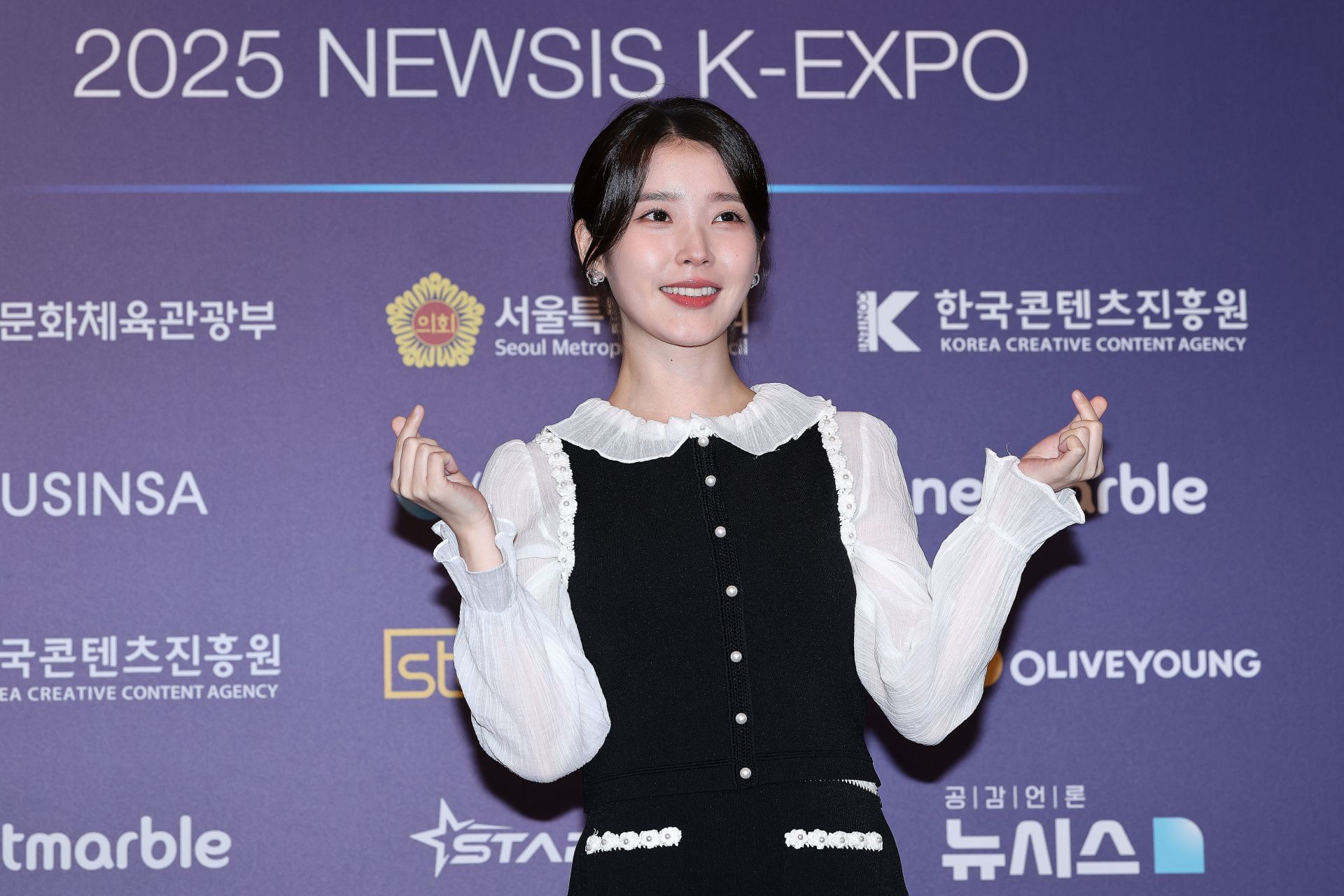 Actress and singer IU, aka Lee Ji-Eun, poses for a photocall for the 2025 Newsis K-Expo at Lotte Hotel Seoul on August 28, 2025, in Seoul, South Korea. (Photo by Han Myung-Gu/WireImage)
