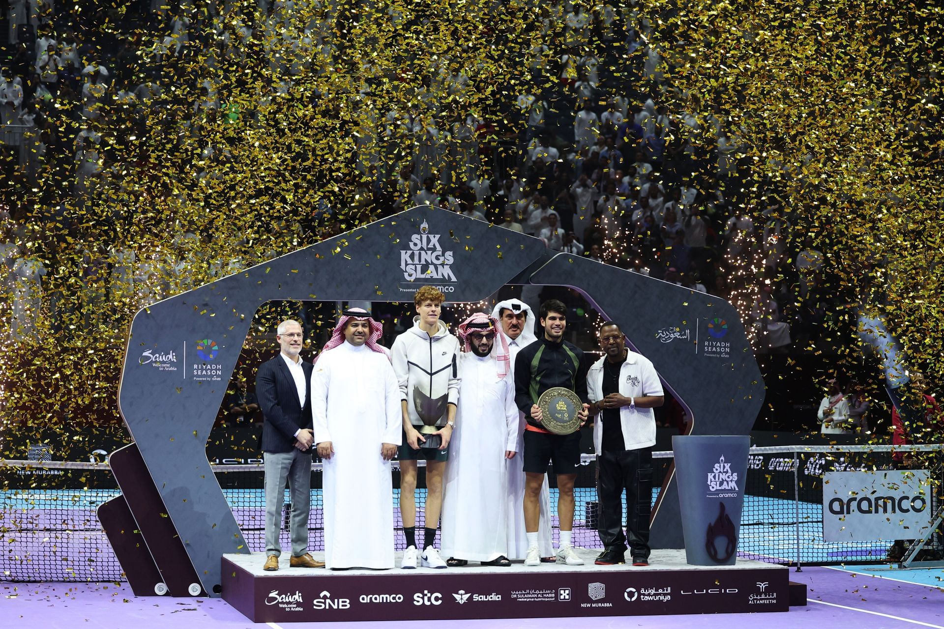 Jannik Sinner and Carlos Alcaraz with their trophies at the Six Kings Slam 2024 - Source: Getty