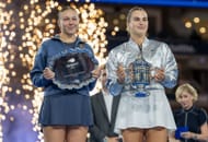 Amanda Anisimova (left) and Aryna Sabalenka (right) pose with their women's singles runner-up and winner's trophies respectively at the 2025 US Open (Source: Getty)