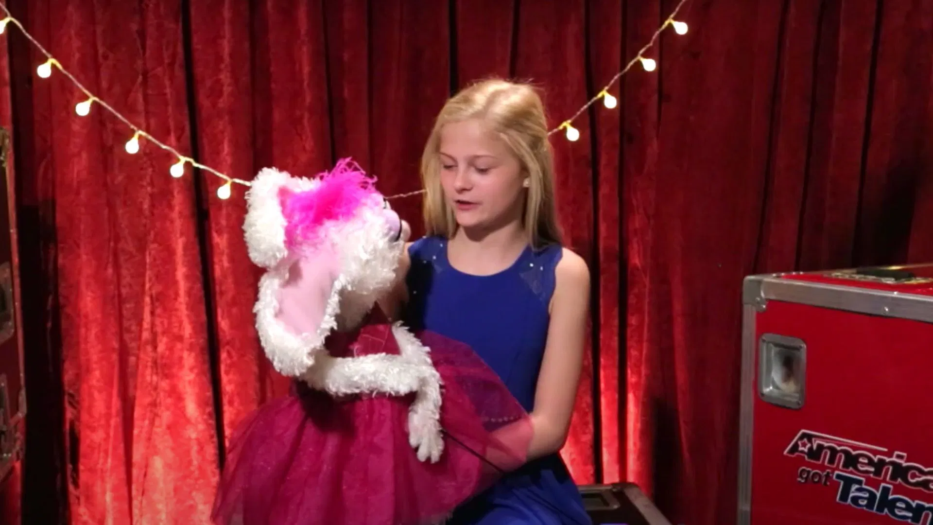 Darci and her puppet on the show (Image via YouTube/America&#039;s Got Talent)