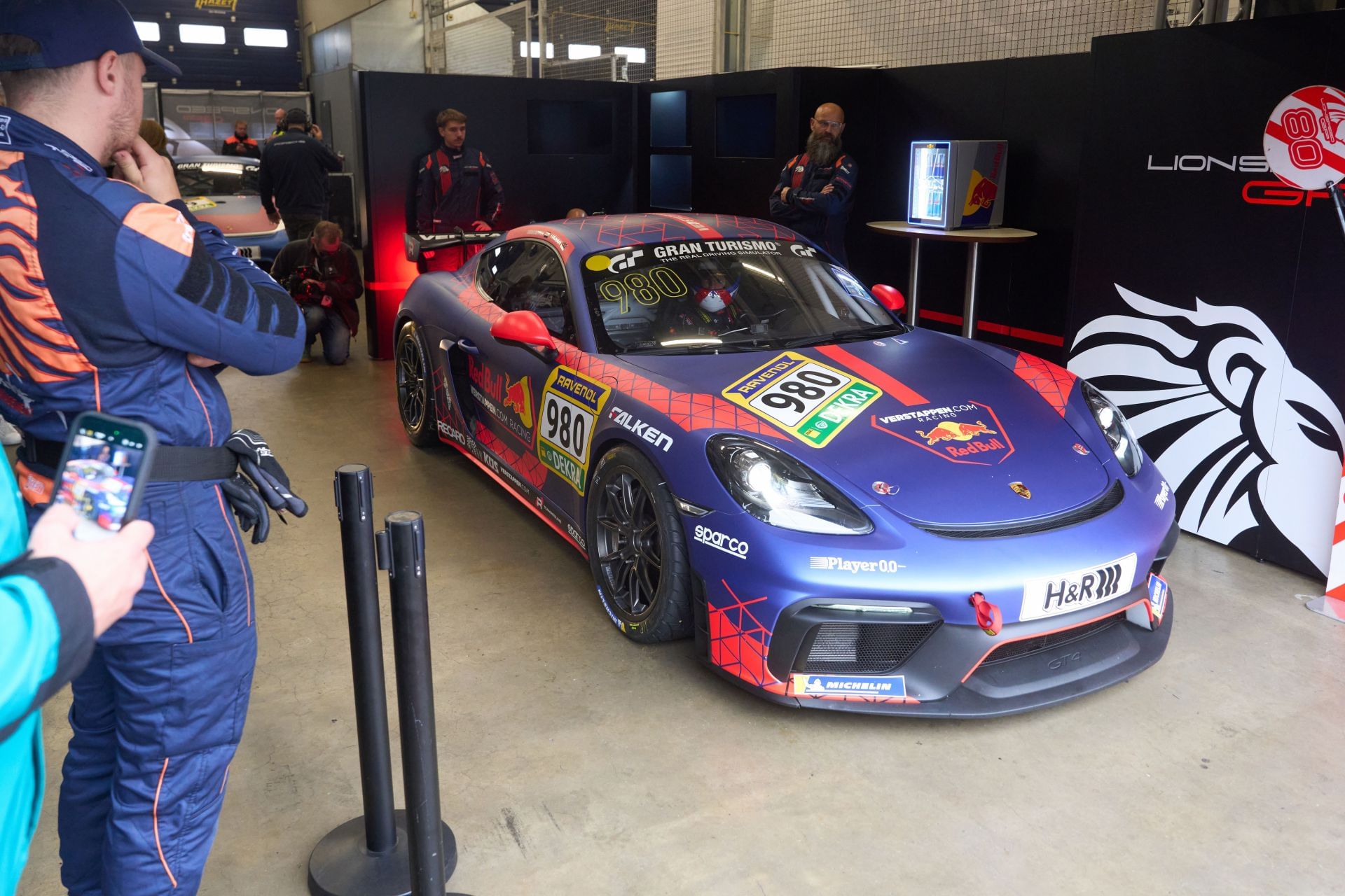 Max Verstappen sitting in a detuned Porsche Cayman GT4 at the Nurburgring - Source: Getty