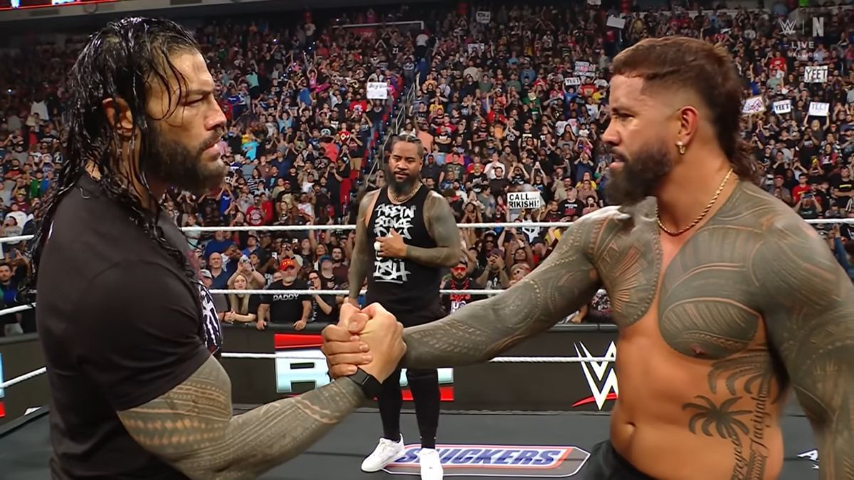 Roman Reigns reunited with The Usos on RAW. [Image via WWE YouTube]