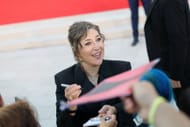 Mayim Bialik at Father Mother Sister Brother" Red Carpet (Image via Getty)