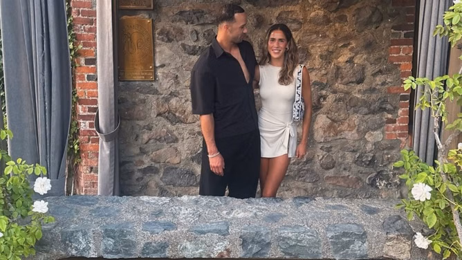 Jack Flaherty's girlfriend, Katie Johnson, takes on thrilling jet ski ride across blue waves during tropical escape