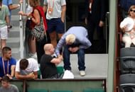 Boris Becker and Andre Agassi greet each other at the 2017 French Open - Source: Getty