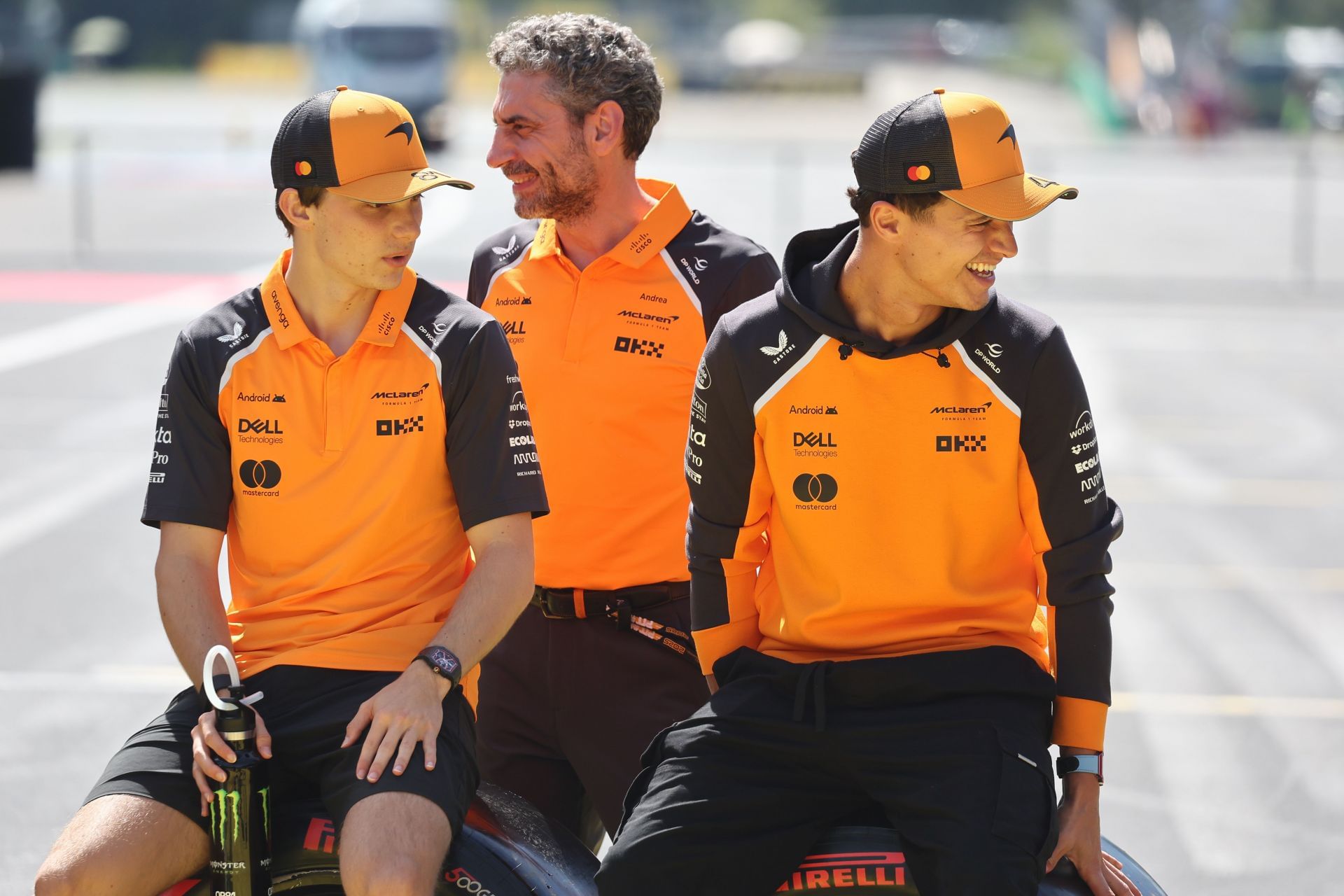 Oscar Piastri, Andrea Stella, and Lando Norris at Monza. Source: