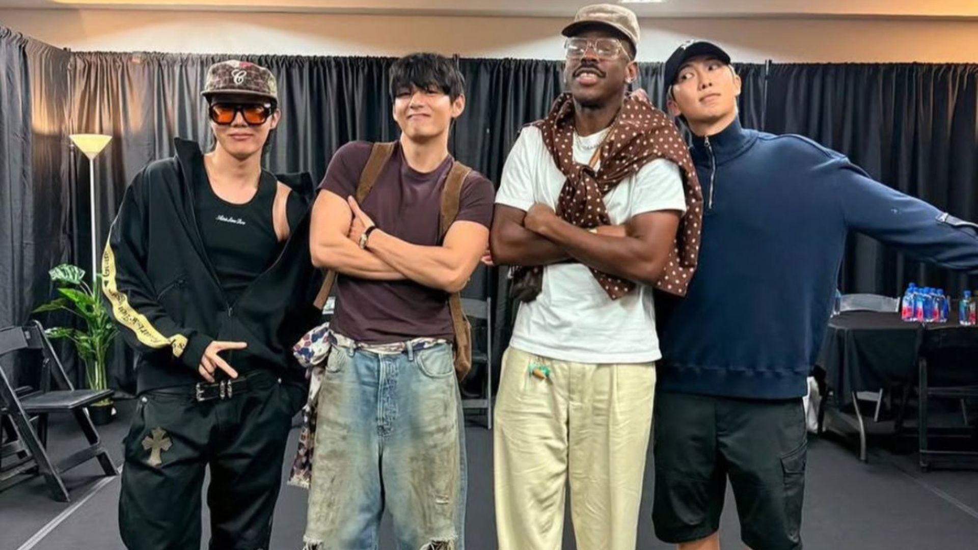 BTS&#039; Taehyung with j-hope, RM, and Tyler, the Creator at Chromakopia: The World Tour (Image via Instagram/@rkive)