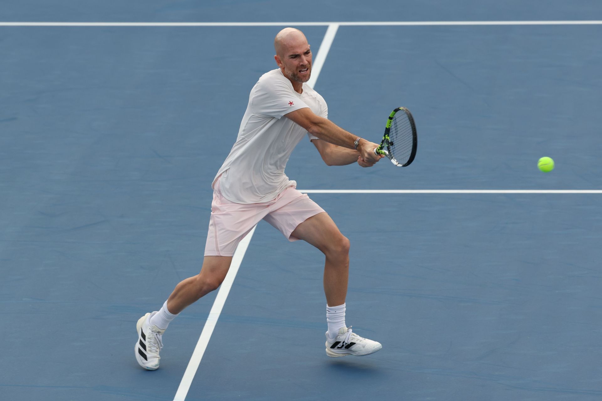 Adrian Mannarino hits a backhand | Image Source: Getty