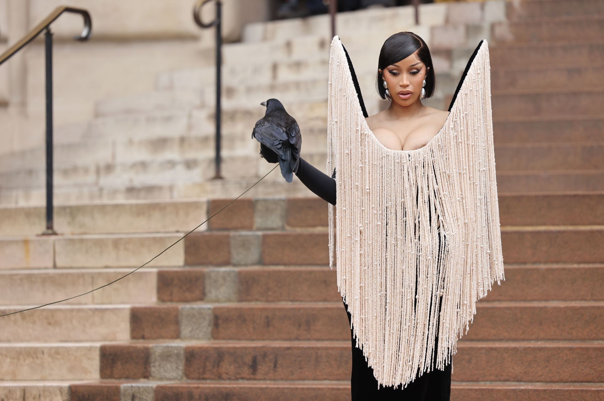            Cardi B at the Paris Fashion Week on July 07, 2025. (Image via Getty)