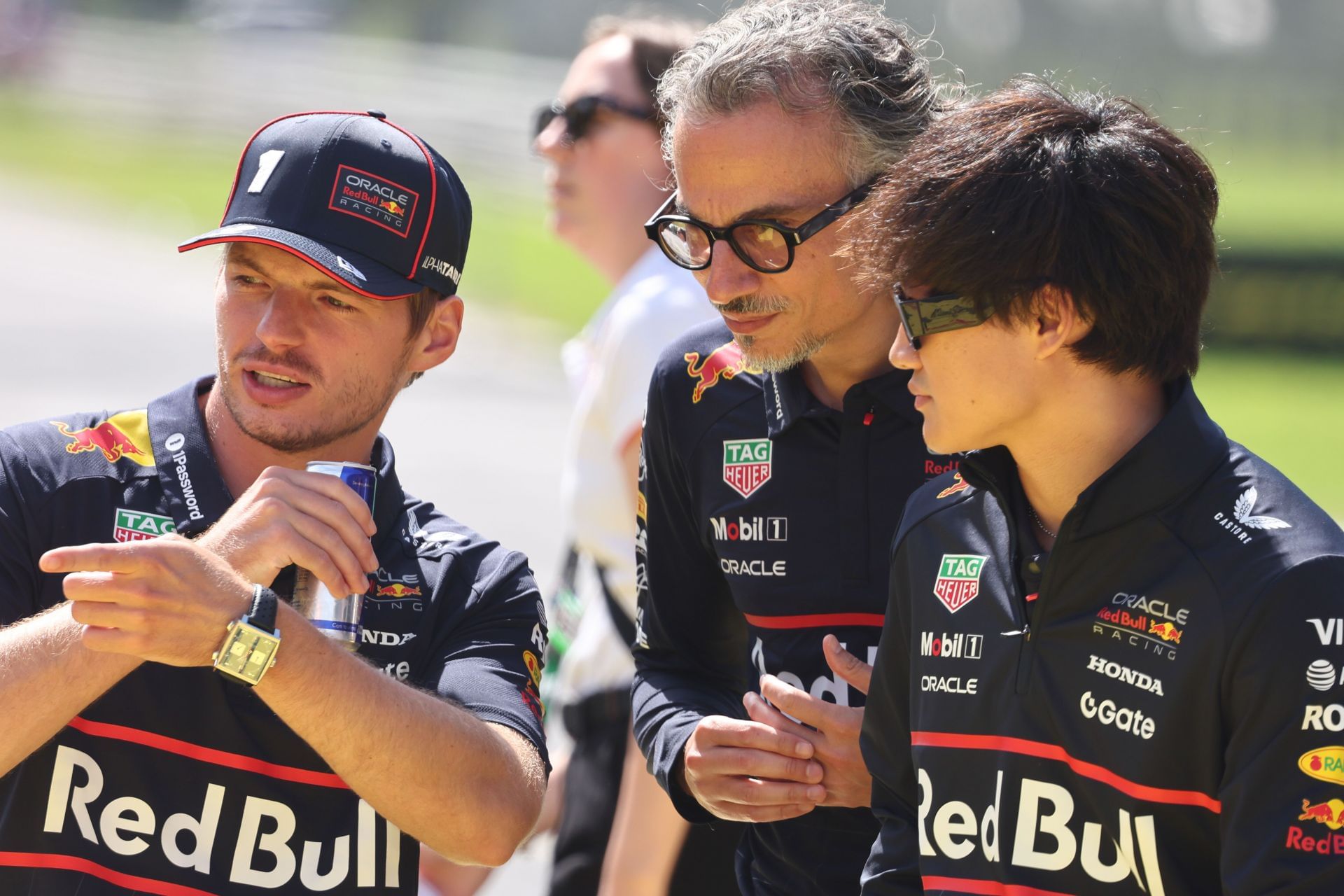 (L-R) Max Verstappen, Red Bull Team Principal, Laurent Mekies, and Yuki Tsunoda at Monza. Source: Getty