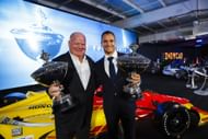 Chip Ganassi and Alex Palou pose with their IndyCar championship trophies at the post-season Awards Ceremony - Source: Getty