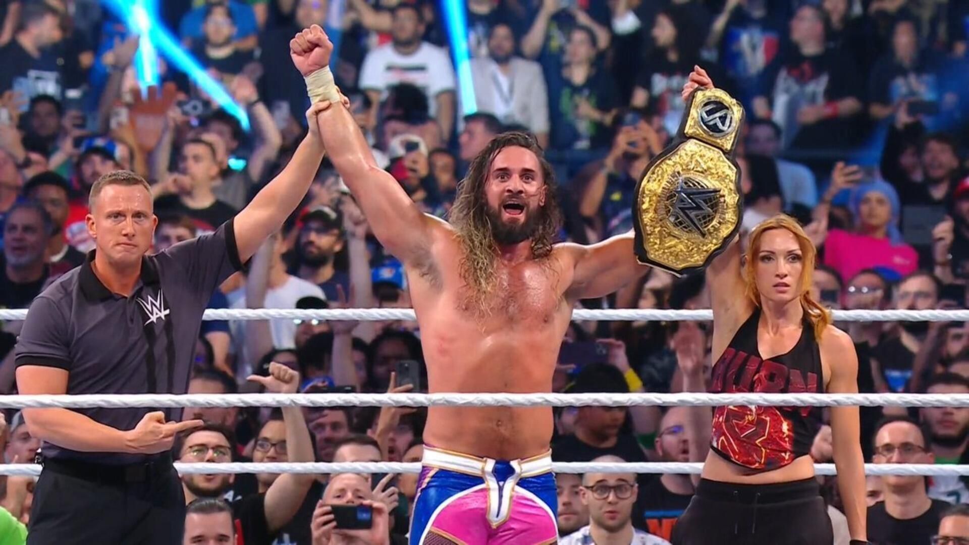 Seth Rollins and Becky Lynch celebrate in Paris