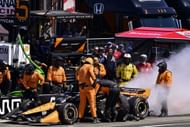Pato O'Ward's car undergoing repairs on pit road at the 2025 IndyCar Grand Prix of Portland - Source: Getty