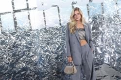 Alica Schmidt steals the spotlight in gray co-ord set as guest at major German brand’s show after four years on the runway