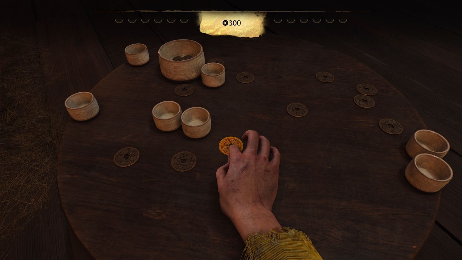 Playing the Zeni Hajiki (mini-game) in Ghost of Yotei (Image via Sucker Punch)