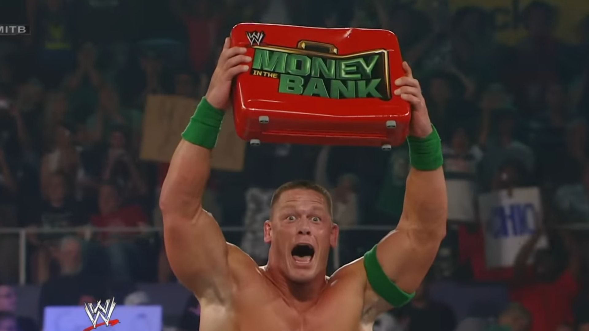 John Cena with the Money in the Bank briefcase (Image via WWE