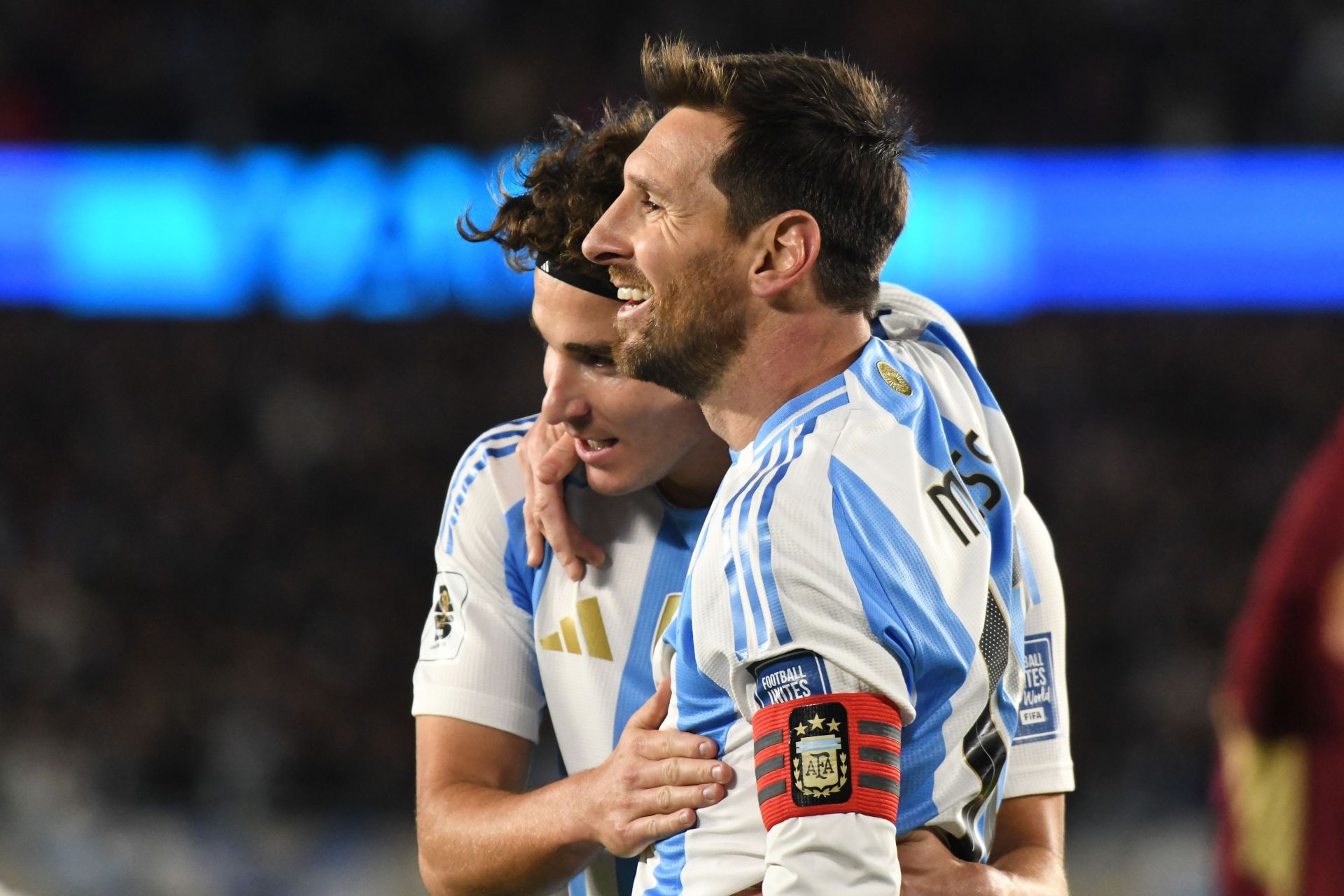 Argentina captain Lionel Messi (right)