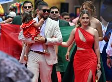 Jonathan Aranda and wife Milka make a splash together in chic black swimwear and hot red nails