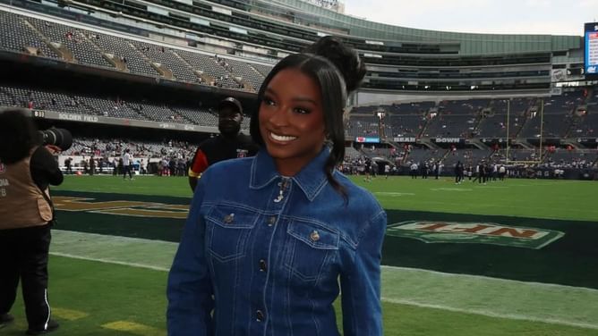 Simone Biles rocks denims along with customised white boots while cheering for husband Jonathan Owens in latest Chicago Bears game