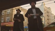 Lipa and Shmully, Orthodox Jewish siblings in the movie (Image via YouTube/Sony Pictures Entertainment)