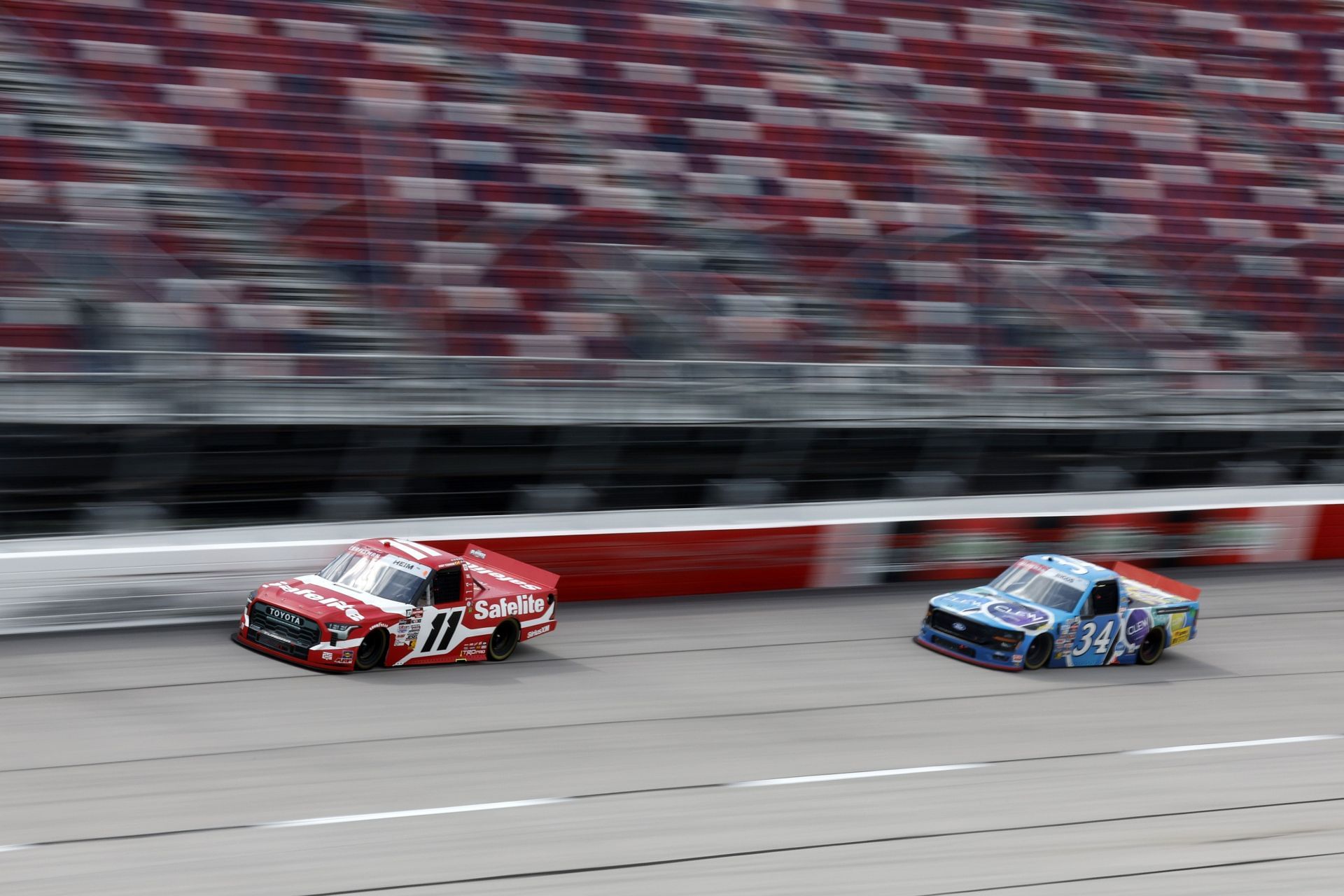 Corey Heim (11) and Layne Riggs (34) at Darlington Raceway. Source: Getty
