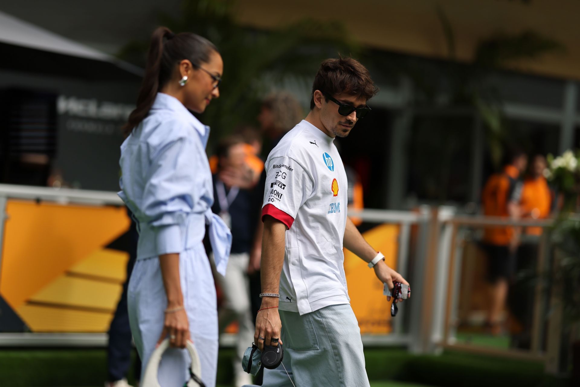 Alexandra Saint Mleux (L) and Charles Leclerc (R) at the 2025 F1 Grand Prix Of Miami - Source: Getty