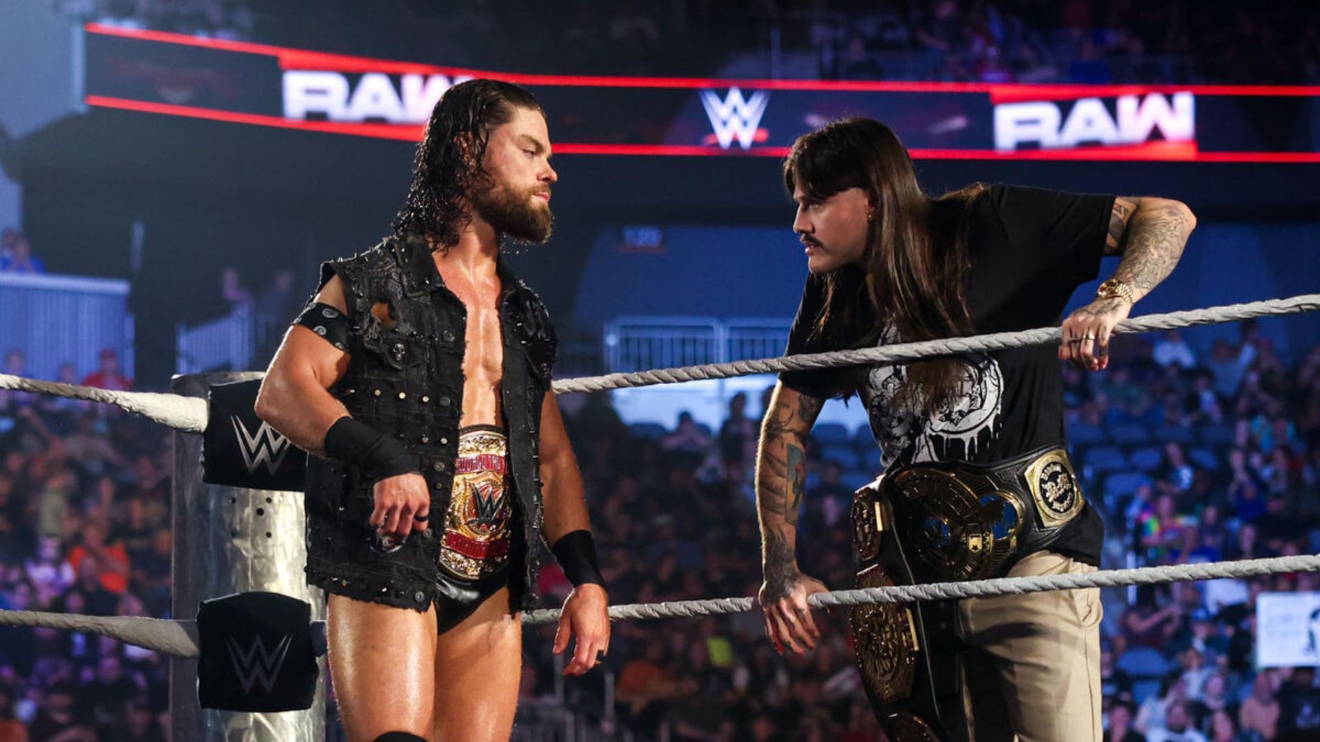 The WWE Tag Champion demands compensation after a job well done...kind of (Credit: WWE.com)