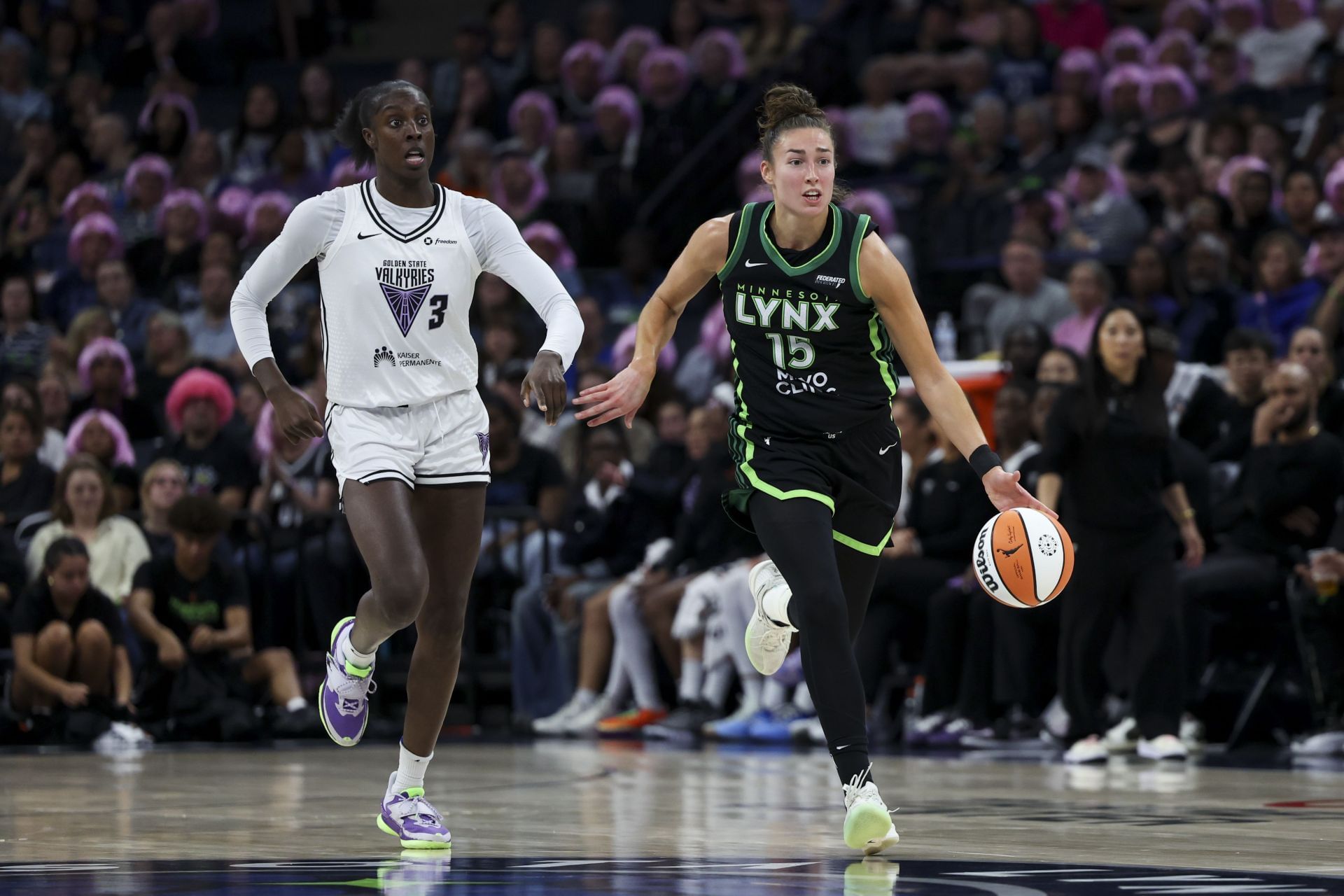 Jessica Shepard #15 of the Minnesota Lynx dribbles up the court against Laeticia Amihere #3 of the Golden State Valkyries - Source: Getty