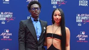 Jazz Chisholm Jr.'s girlfriend Olivia Brown rocks combo of white tee, body shorts, and faux fur leg warmers in stylish mirror selfie