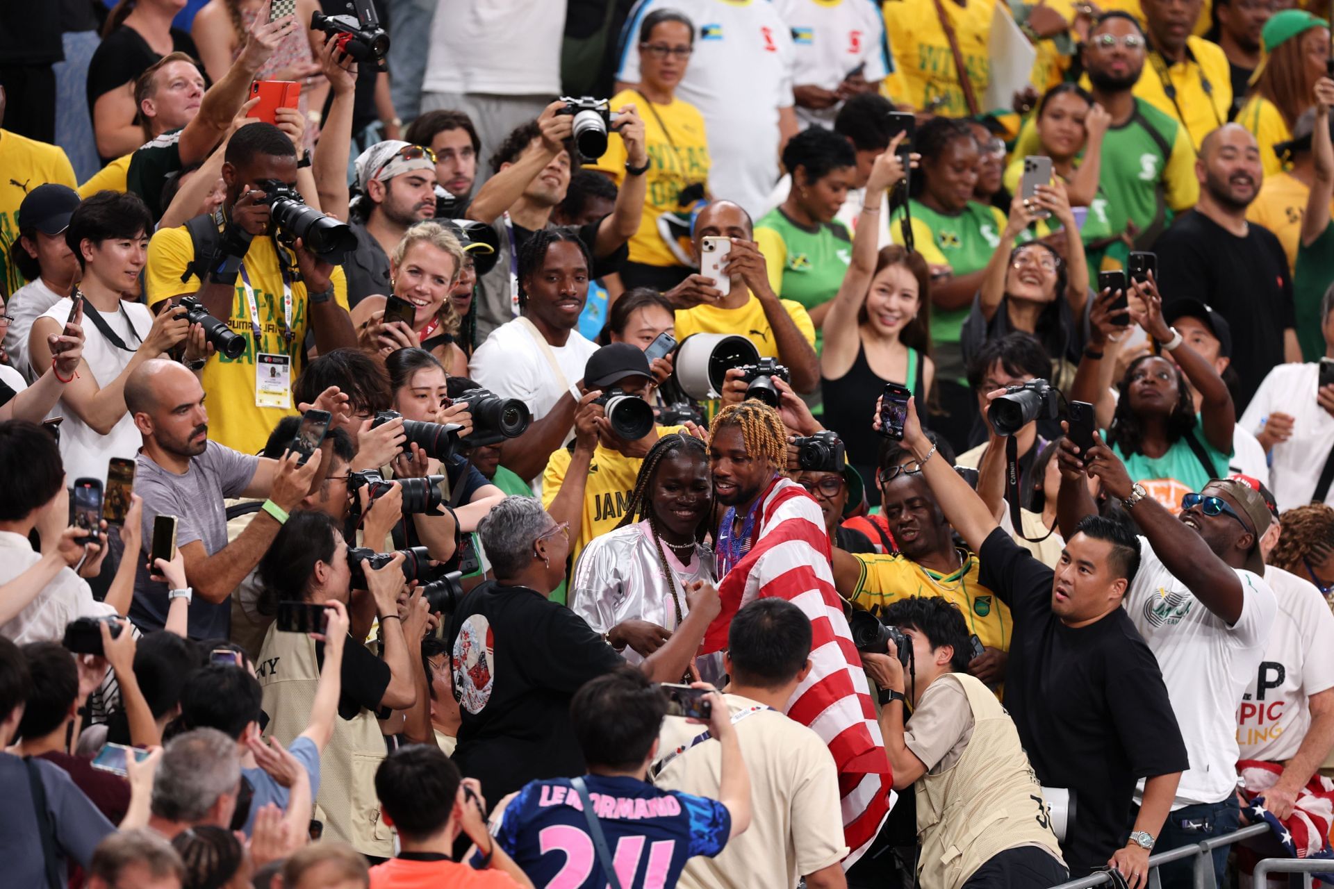Junelle Bromfield with Noah Lyles after his 200m victory at the World Championships [Image Source : Getty] 