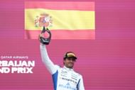 Williams' Carlos Sainz holding the third-place trophy on the podium after the F1 Grand Prix of Azerbaijan 2025 - Source: Getty