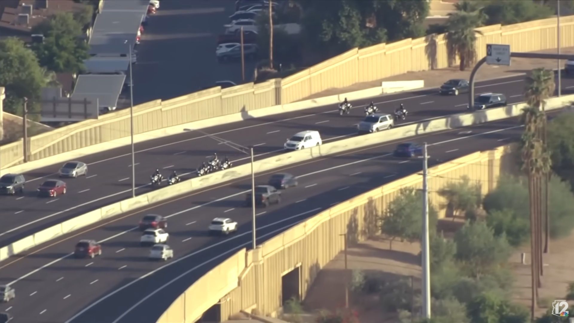 The actual motorcade for Charlie Kirk as captured by 12 News. (Image via YouTube/12 News)