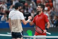 Valentin Vacherot (left) and Novak Djokovic (right) shake hands at the net after the Monegasque's victory against the Serb in the semifinals of the 2025 Shanghai Masters (Source: Getty)