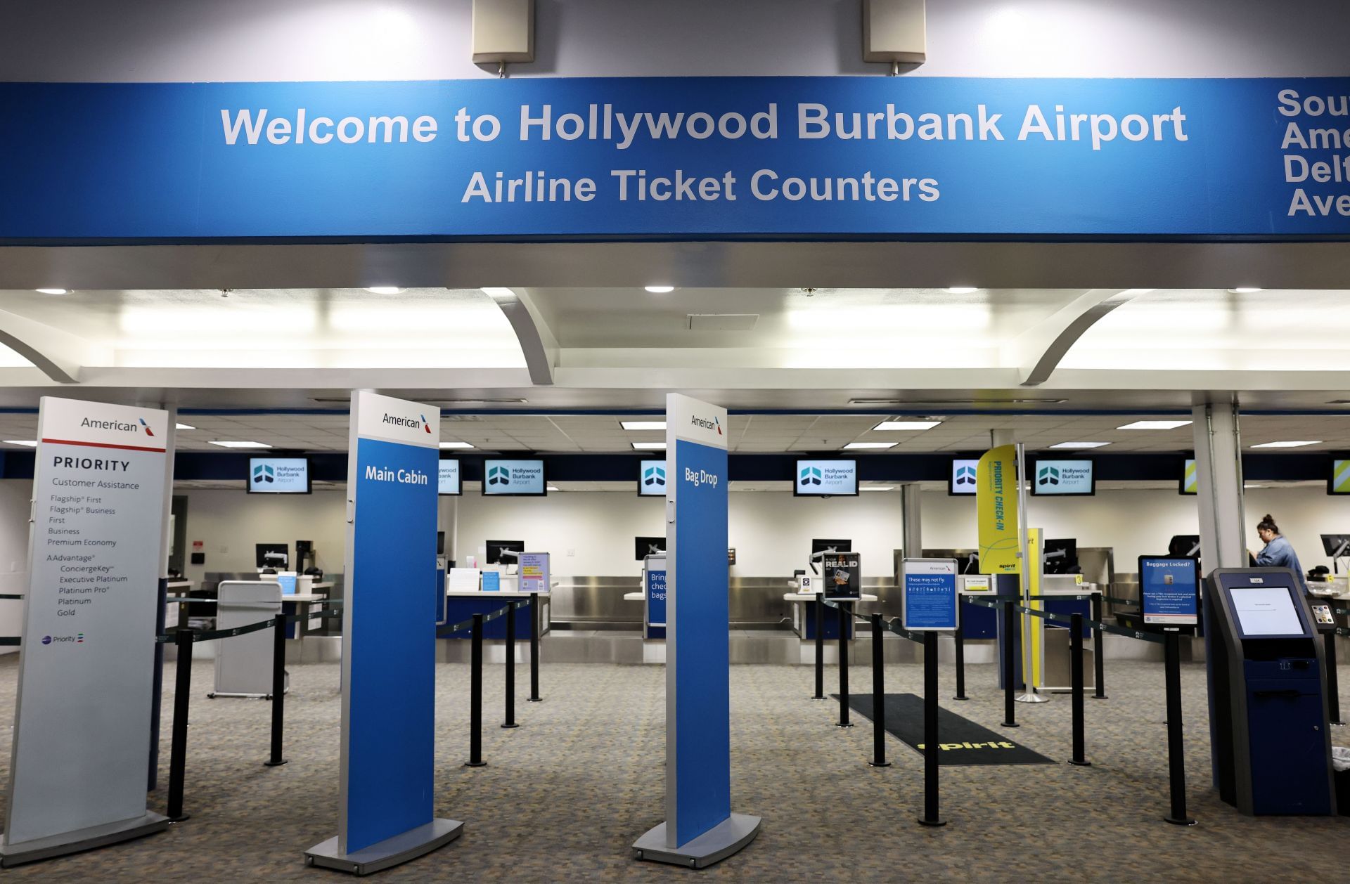 The American Airlines ticket counter stands empty at Hollywood Burbank Airport on October 6, 2025 (Image via Getty)