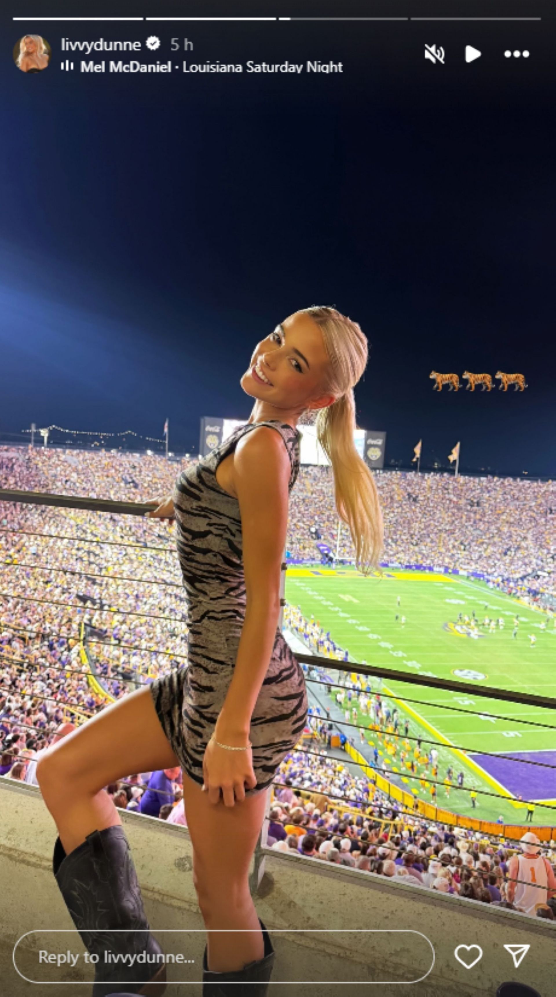 Dunne poses in leopard print at LSU match; Instagram - @livvydunne