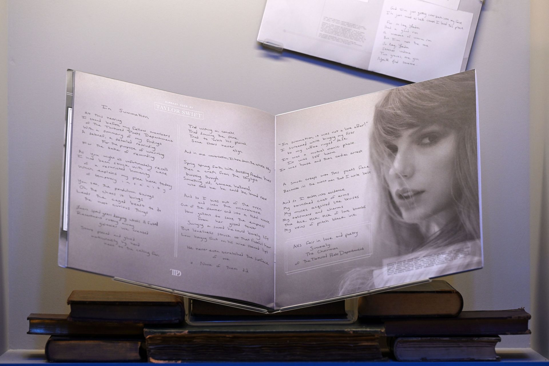 The Tortured Poets Department album on display at the Taylor Swift &quot;Songbook Trail&quot; photocall at The V&amp;A on July 24, 2024, in London, England. (Image via Getty)