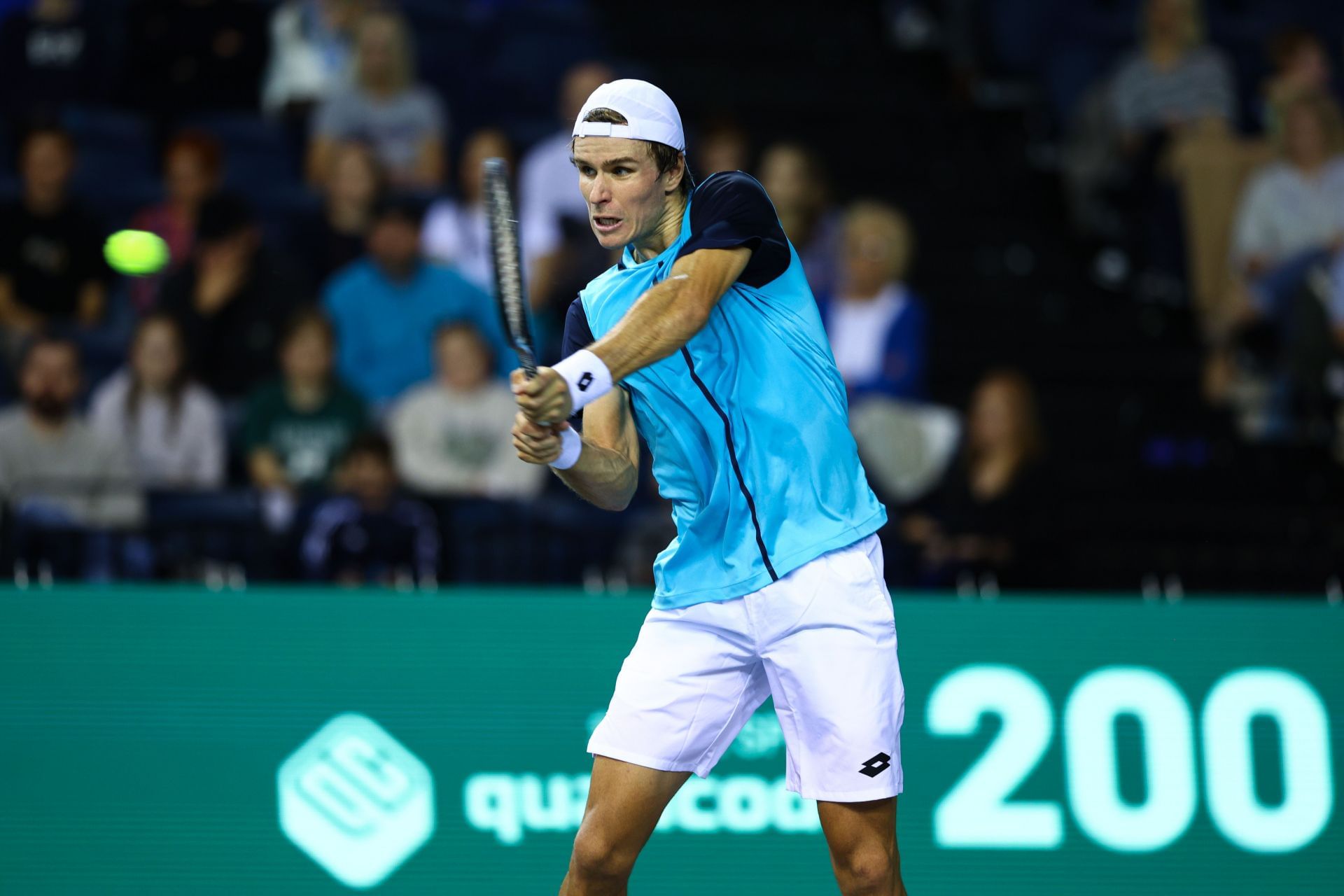 Dmitry Popko hits a backhand | Image Source: Getty