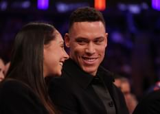 Aaron Judge’s walk-up lyric comes to life as he and wife Samantha chill courtside with Carmelo Anthony at Knicks game