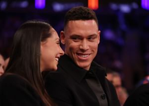 Aaron Judge’s walk-up lyric comes to life as he and wife Samantha chill courtside with Carmelo Anthony at Knicks game