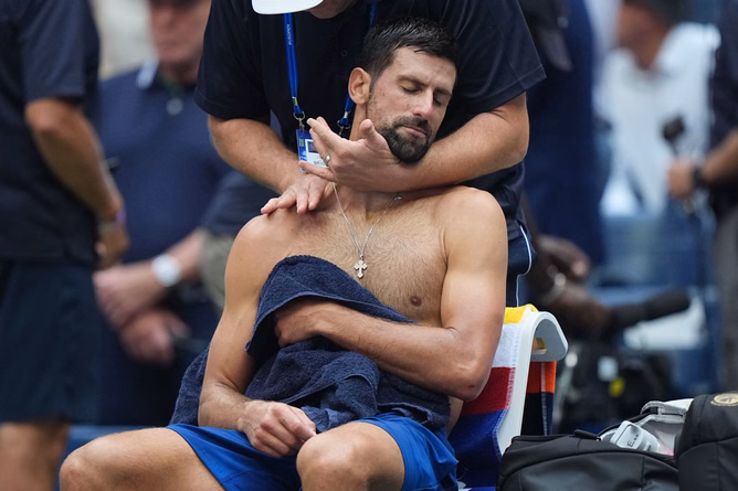 WATCH: Novak Djokovic throws up mid-match in alarming scenes as he battles 'brutal' conditions at Shanghai Masters
