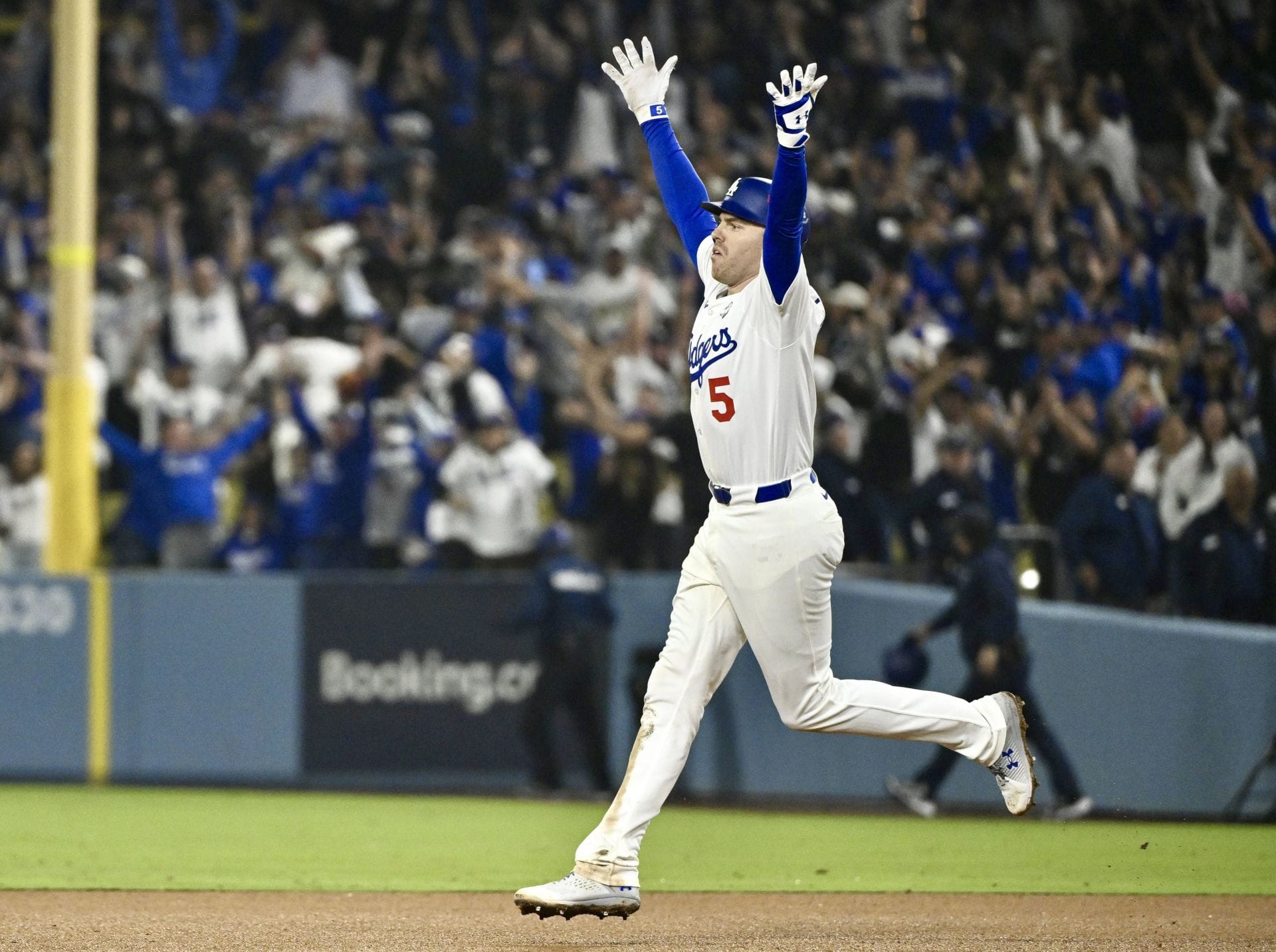 Freddie Freeman celebrates after hitting a walk-off home run in the 18th inning against the Toronto Blue Jays to win game 3 of the World Series - Source: Getty