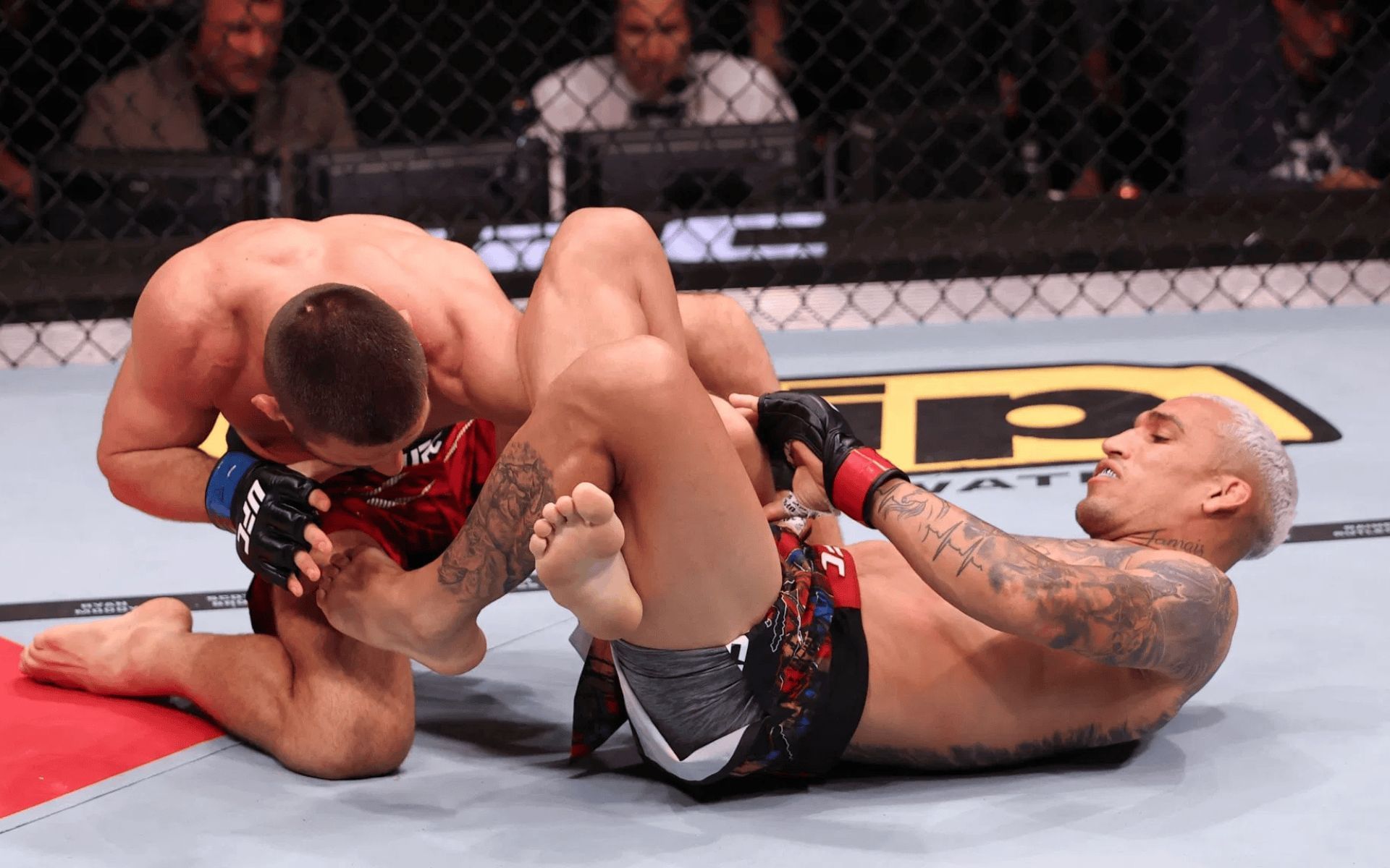 Charles Oliveira in action against Mateusz Gamrot at UFC Rio. [Image courtesy: Getty]